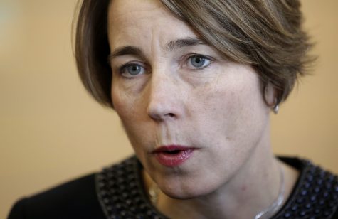 FILE - In this Jan. 22, 2015, file photo, Massachusetts Attorney General Maura Healey speaks with members of the media after testifying before the Massachusetts Gaming Commission in Boston. Healey is scheduled to issue rulings Wednesday, Sept. 2, 2015, on the constitutionality of more than 30 initiative petitions. (AP Photo/Steven Senne, File)