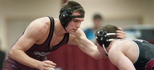 Former Barnstable High wrestler Will Henson, seen competing last week for Springfield College, holds Barnstable's all-time record for career wins at 164-20. Photo courtesy of Springfield Athletics