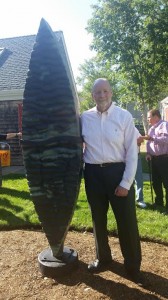 Artist Steven Kemp with his artwork "The Tides".