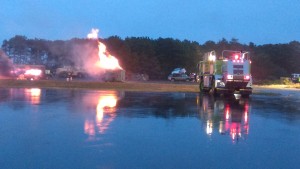 A Barnstable Municipal Airport Fire Crew participates in the disaster drill.