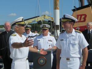 CCB MEDIA PHOTO Richard Gurnon embraces Francis McDonald after the formal change of command at the Massachusetts Maritime Academy in Buzzards Bay Monday
