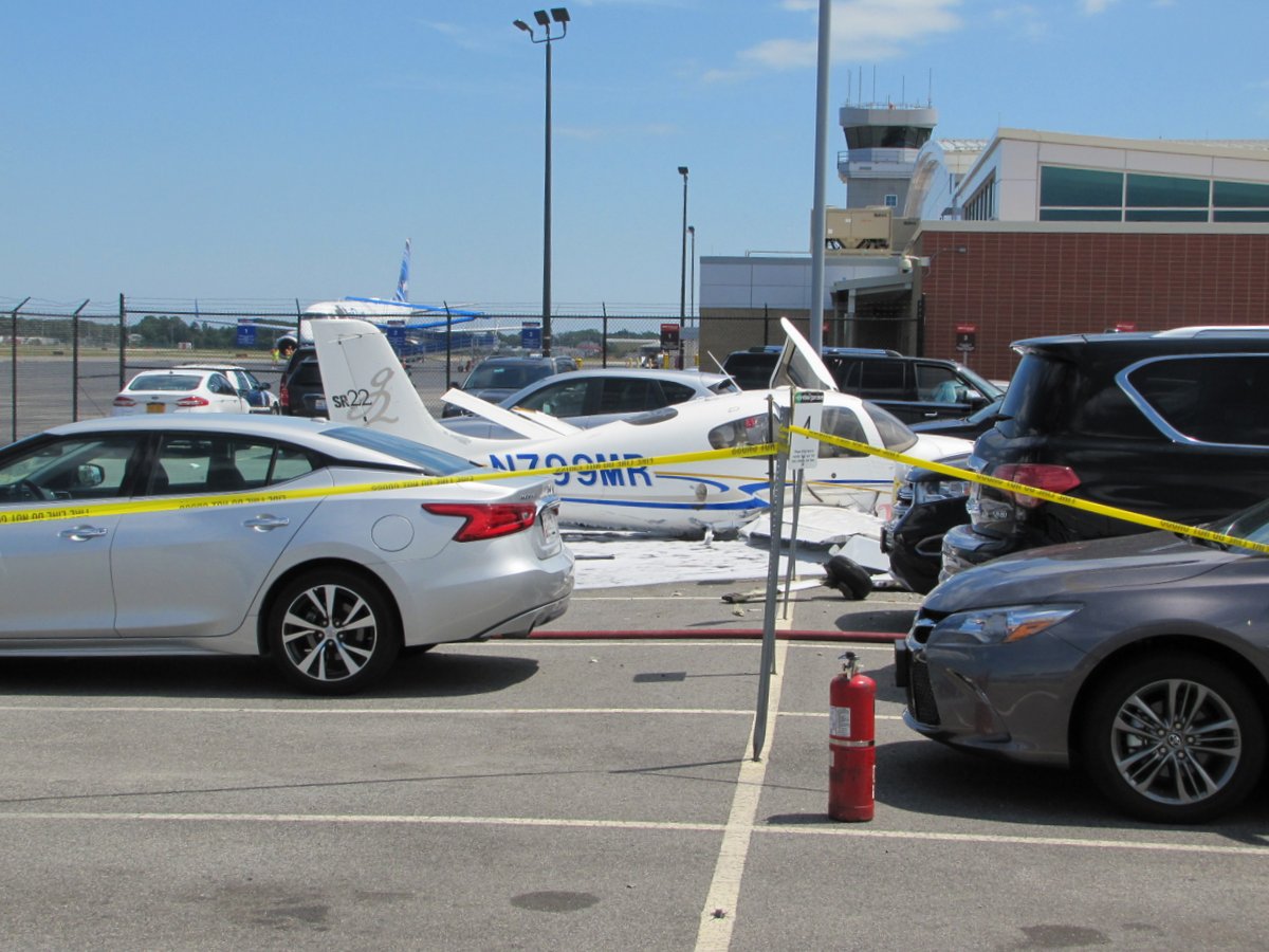 Updated Plane goes off runway into parking lot at Hyannis airport