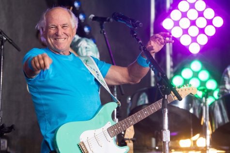 Jimmy Buffett performs on NBC's "Today" show at Rockefeller Plaza on Friday, July 29, 2016, in New York. (Photo by Charles Sykes/Invision/AP)