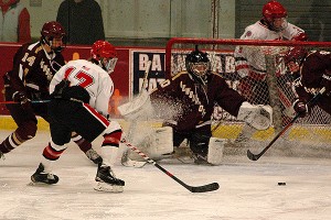 Barnstable junior forward Matt Kaski races to the puck in front and scores as Newburyport's Harry Good (14) and Tanner Derby (9) try to defend goalie Ken Hodge (30) to little avail. Sean Walsh/www.capecod.com sports