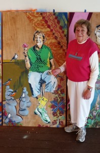 CCB MEDIA PHOTO Arlene Johnson, of Centerville, poses next to her portrait at the Guyer Barn.