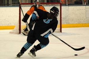 Sandwich High School senior co-captain Katie Lowry netted a hat trick last night to help pace the Blue Knights to the Kostas Tournament Championship crown. Sean Walsh/www.capecod.com sports