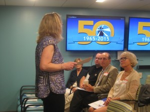 CCB MEDIA PHOTO Barnstable County Commissioner Sheila Lyons, State Senator Dan Wolf and State Representative Brian Mannal listen as Duffy Health Center CEO Heidi Nelson speaks during the Community Health Centers Legislative Breakfast Wednesday at Harbor Community Health Center in Hyannis.
