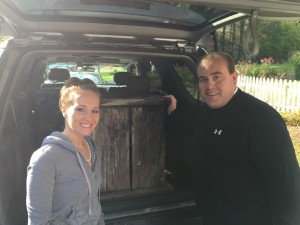 Allison Mace of Eastham (L) with Sandwich Town Collector Bill Jennings (R) After Purchasing The Old Sandwich Wooden Water Bubbler Box