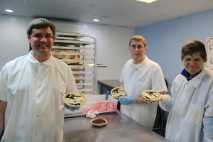 CCB MEDIA PHOTO Ben Ninesling, Bryan Kent and Donna Ellison, who are Centerville Pie employees and also Cape Abilities clients, show off their American flag pies.