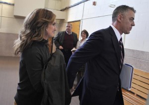 FALMOUTH-- 02/16/16-Brian Hyde holds his wife Kristen's hand as they head out of court after Judge Mary Orfanello found Hyde not guilty. Steve Heaslip/Cape Cod Times021716sh23