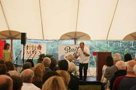COURTESY OF MARTHA'S VINEYARD COMMUNITY SERVICES: Auctioneer Jimmy Tingle engages the crowd at the 2015 Possible Dreams Auction. (photo by Susan McConnell Photography)