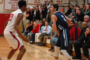 Sandwich High senior co-captain Joey Downes turned in a 21-point performance as his Blue Knights took down Case, 96-58. Sean Walsh/capecod.com sports