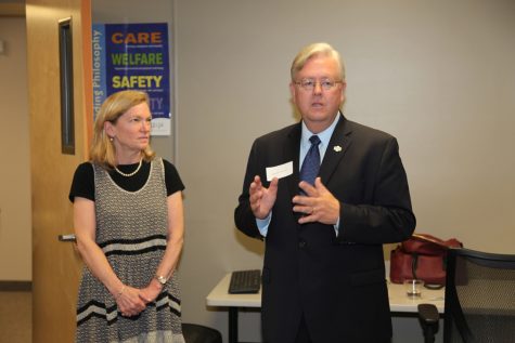 Sandwich State Representative Randy Hunt speaks while Duffy CEO Heidi Nelson listens during an open house event on Tuesday.