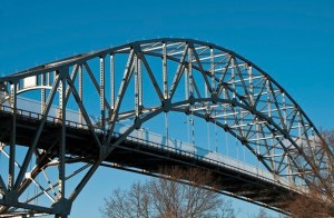 The Sagamore Bridge has a vertical clearance of 135 feet at mean high water.