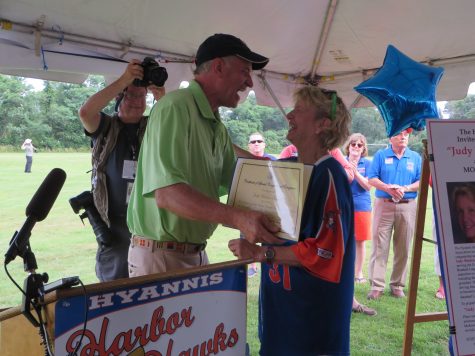 CCB MEDIA PHOTO: Congressman William Keating presents former Cape League President Judy Walden Scarafile with a Congressional proclamation during a ceremony re-name McKeon Field in Hyannis in her honor.