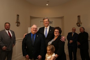 Governor Charlie Baker with Plymouth County Sheriff Joseph McDonald, McDonald's wife Renee and McDonald's daughter Elise.