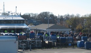 CCB MEDIA PHOTO: Hundreds of travelers get ready to board the ferry from Hyannis to Nantucket on one of the busiest travel days of the year