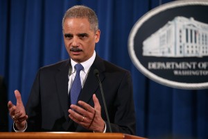 WASHINGTON, DC - FEBRUARY 05: U.S. Attorney General Eric Holder leads a news conference with attorneys general from eight states and the District of Columbia at the Department of Justice February 5, 2013 in Washington, DC. Holder announced that the United States is bringing a civil lawsuit against the ratings agency Standards & Poor's and its parent company, McGraw-Hill Companies, over its pre-fiscal crisis bond ratings. (Photo by Chip Somodevilla/Getty Images)