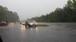 Motorists pull off Rt. 6 in Yarmouth as strong storms flooded roads Wednesday morning.