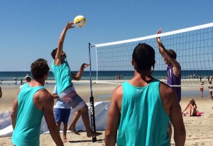 Players compete in the 2014 charity volleyball event in Dennis