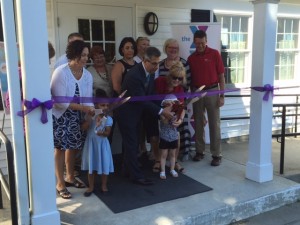 YMCA, North Falmouth Congressional Church, and Falmouth Chamber of Commerce Officials participate in a ribbon cutting ceremony at the new Early Childhood Education Center