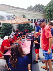PHOTO COURTESY JUDY SCARAFILE Cape Cod Baseball League players sign autographs at the Cape League's annual Baseball Day in 2014.