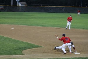 Safe at first during Thursday night's game at Guv Fuller Field.