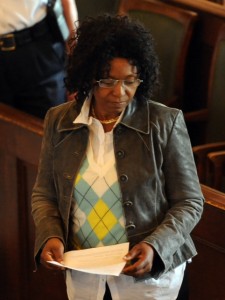 MERRILY CASSIDY/CAPE COD TIMES POOL Vivienne Walker, the mother of Trudie Hall, returns to her seat in court after reading a witness statement to the judge about the affect of her daughter's murder on her and her family. 
