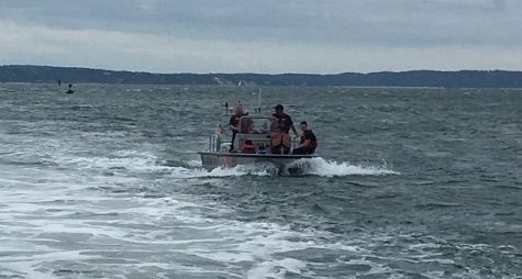 Coast Guard Aide to Navigation team Woods Hole 20-foot boat crew is underway transiting to a Nonsmesset Island, MA on Aug. 10, 2016. The crew was called in to help rescue four people stranded on the island after their boat ran aground. (U.S. Coast Guard photo by Petty Officer 2nd Class Douglas Meade)