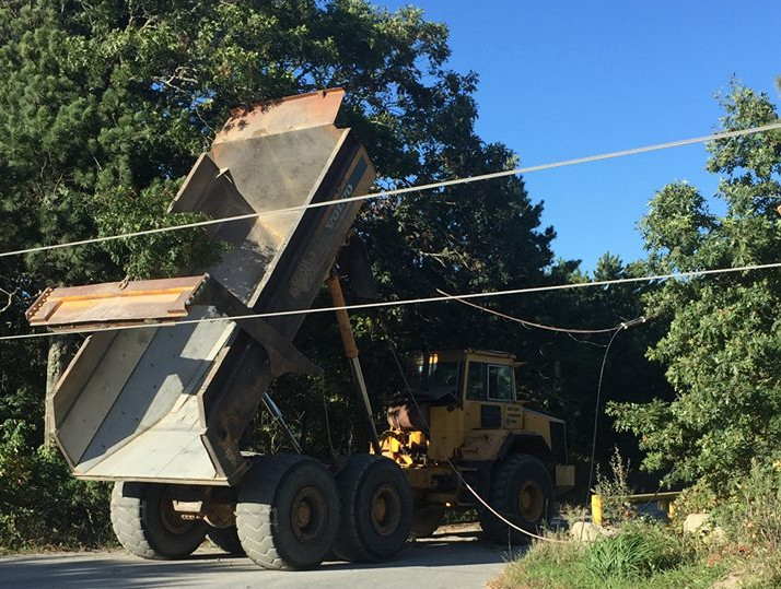 Dump truck vs pole causes major delays, power outages in Falmouth