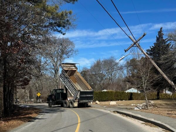 Dump truck snags wires, topples utility pole in Falmouth
