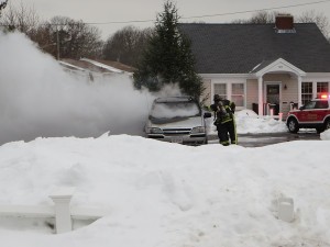 CCB MEDIA PHOTO Firefighters responded to a car fire at the Dunkin Donuts.