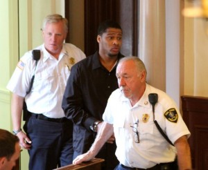 CCB MEDIA PHOTO Eddie Mack of Roxbury, a suspect in the 2011 murder of Andrew Stanley in Hyannis, is led into Barnstable Superior Court.