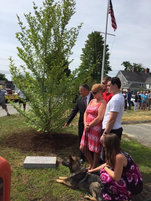 The family of fallen deputy John R. Kotfila Jr. at a tree dedication ceremony in the fallen deputy's honor.
