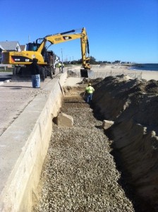 Falmouth Department of Public Works crews work on a new handicapped ramp at Falmouth Heights Beach.