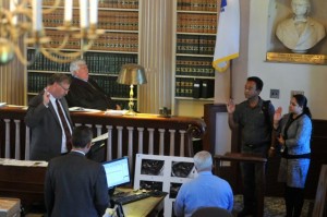 STEVE HEASLIP/CAPE COD TIMES POOL Ram Rimal, who was married to Trudie Hall at the time of her murder, testifies with the assistance of a Nepalese interpreter during the trial of Quoizel Wilson in Barnstable Superior Court.