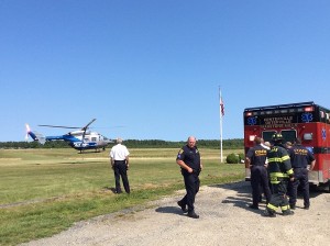 A medflight helicopter lands at Cape Cod Airport in Marstons Mills this morning to bring a child hit by a car to a Boston hospital.