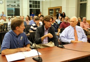 CCB MEDIA FILE PHOTO Greg Bar, manager of the NOAH homeless shelter, talks about clients at the center, while Housing Assistance Corporation chief financial officer Michael Sweeney and HAC CEO and president Rick Presbrey listen at last week's meeting of the Barnstable Town Council.