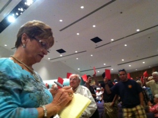 A teller records standing votes for an amendment to reduce the cost of the proposed new Hyannis Fire headquarters.