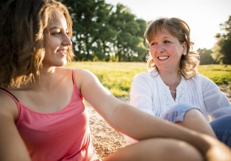 Mother and teenage daughter outdoor portrait