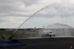 PHOTO COURTESY SARAH COLVIN Jet Blue arrives in Hyannis with a traditional water cannon salute.