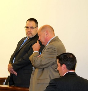 CCB MEDIA PHOTO John Lundborn, former police chief of Truro, with his attorney during his sentencing at Barnstable District Court today.