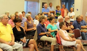 CCB MEDIA PHOTO A standing-room-only crowd turned out to the Falmouth Selectmen's meeting last night to show their opposition to the project to build a Marriott hotel on Main Street.