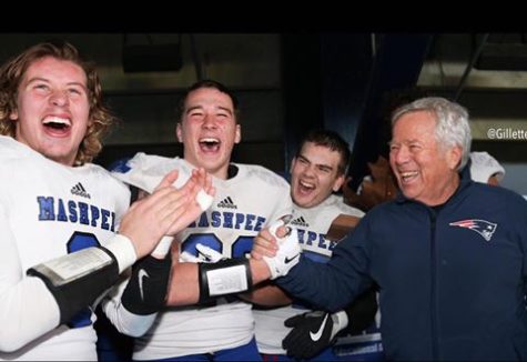 PHOTO COURTESY: Mashpee School Department. Members of the Mashpee High School Football team with Patriots owner Robert Kraft.