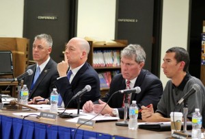 CCB MEDIA PHOTO Mashpee Superintendent of Schools Brian Hyde, at left, listens to Mashpee Town Manager Rodney Collins, along with Mashpee School Committee Chairman Scott McGee, Vice Chairman Don Myers and committee member Chris Santos.