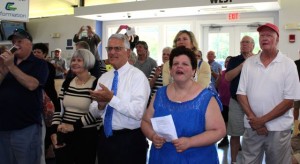 CCB MEDIA PHOTO Applause and looks of amazement greeted the unveiling of the new mural.