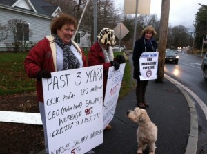 Nurses picket at the hospital lights corner in Falmouth this morning.