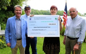 CCB MEDIA PHOTO From Oyster Pond Environmental Trust, Jonathan Smith, Bill Kerfoot, Wendi Buesseler and John Dowling pose in front of Oyster Pond.