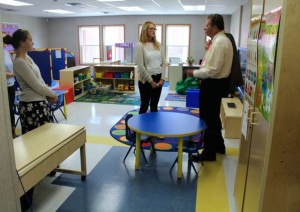 CCB MEDIA PHOTO Barnstable Town Manager Tom Lynch talks to teachers at the new Enoch Cobb Early Learning Center. Early in his career, Lynch was a teacher at Hyannis West Elementary School.