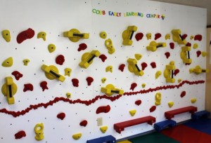 CCB MEDIA PHOTO A colorful climbing wall is one of the innovative features at the new Enoch Cobb Early Learning Center.